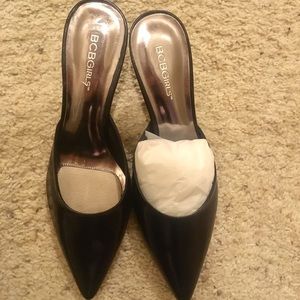 BCBGirls black leather mules slides heels